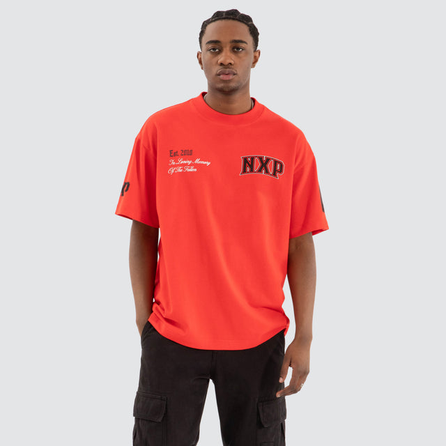 model wears Knockout Raptor Tee Poppy Red T-Shirts Red - image 3