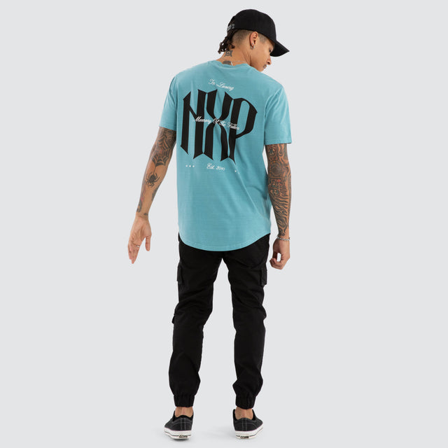 model wears Rush Dual Curved Tee Pigment Cameo T-Shirts Blue - image 4