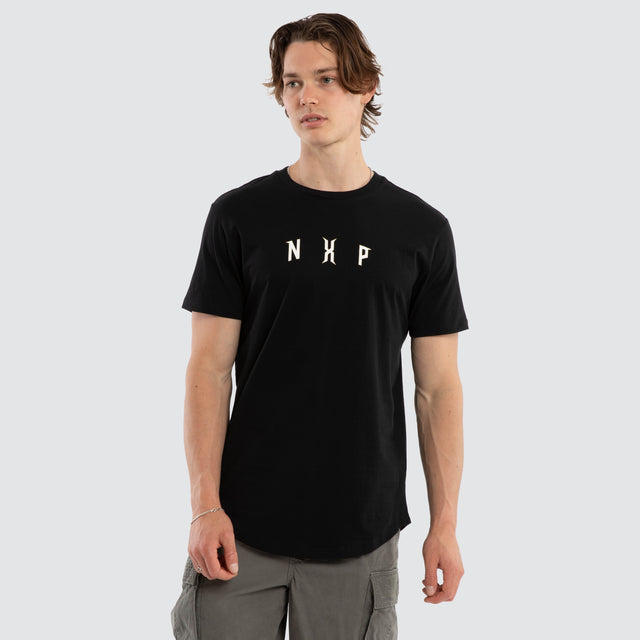 Model wears Dominate Dual Curved Tee Jet Black T-Shirts Black – image 2