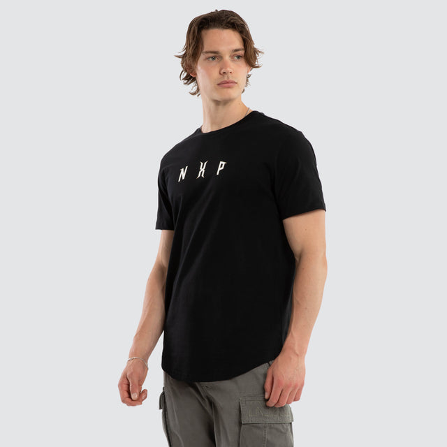 Model wears Dominate Dual Curved Tee Jet Black T-Shirts Black – image 3