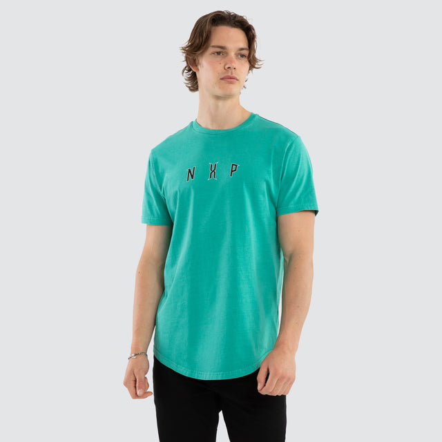 Model wears Dominate Dual Curved Tee Pigment Arcadia T-Shirts Aqua – image 2
