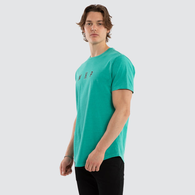 Model wears Dominate Dual Curved Tee Pigment Arcadia T-Shirts Aqua – image 3