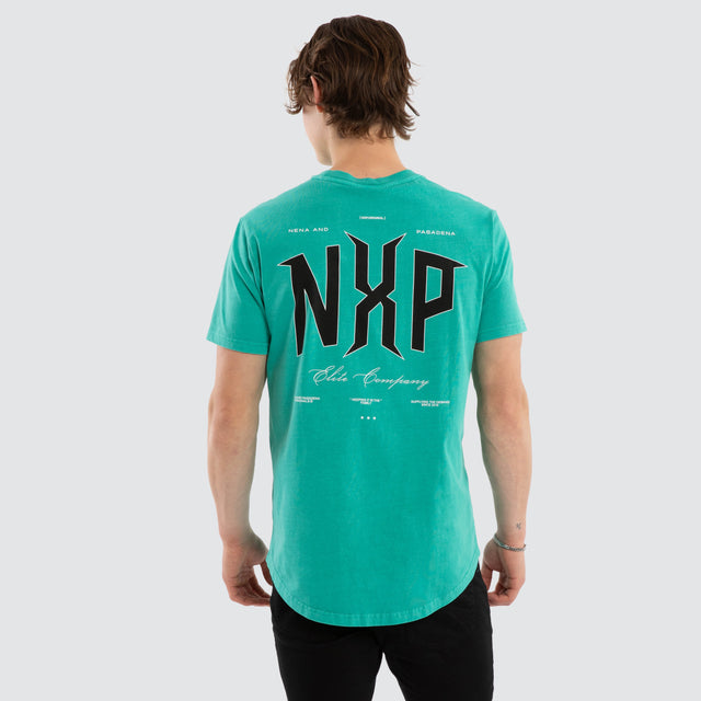 Model wears Dominate Dual Curved Tee Pigment Arcadia T-Shirts Aqua – image 1