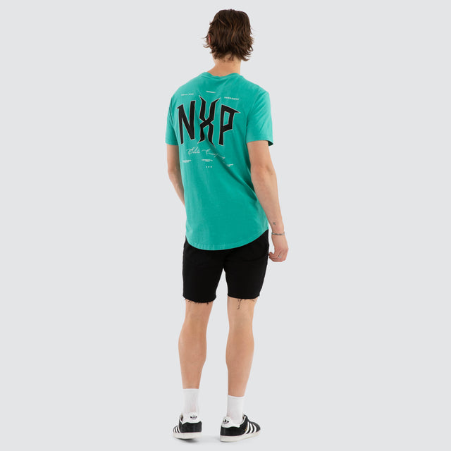 Model wears Dominate Dual Curved Tee Pigment Arcadia T-Shirts Aqua – image 5