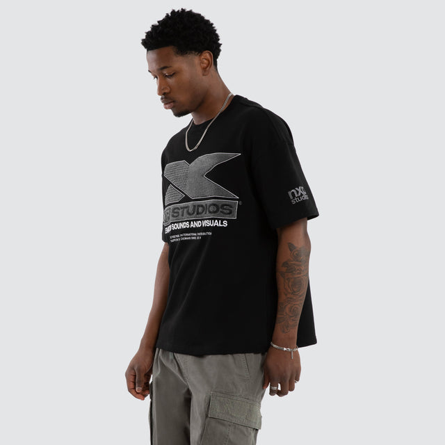 Model wears Exile Loopback Raptor Tee Jet Black T-Shirts Black – image 5