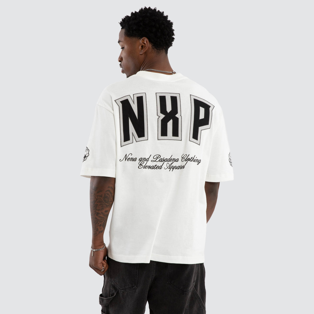 NXP Figures Oversized Tee in White | Neverland Store