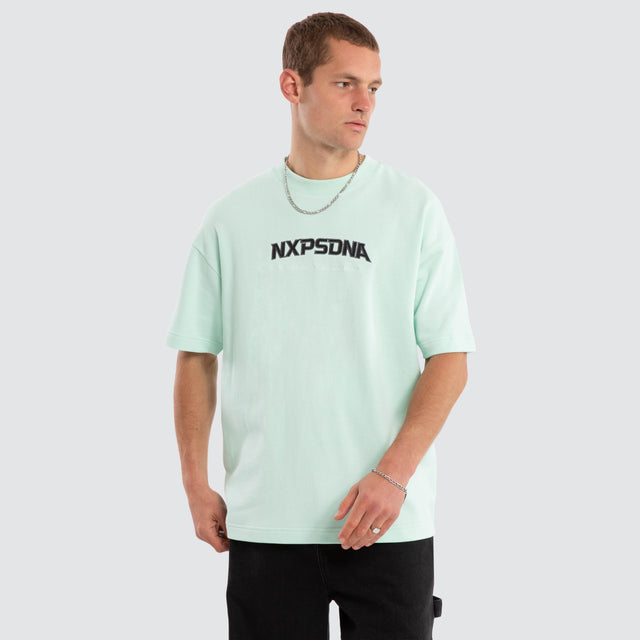 Model wears Airflow Loopback Raptor Tee Brook Green T-Shirts Green – image 3
