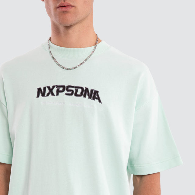 Model wears Airflow Loopback Raptor Tee Brook Green T-Shirts Green – image 4