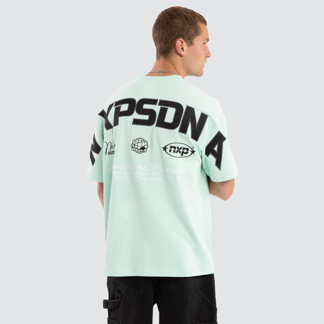 Model wears Airflow Loopback Raptor Tee Brook Green T-Shirts Green – image 1