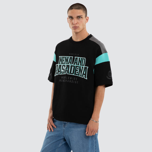 Model wears Conquer Loopback Raptor Tee Black/Turquoise T-Shirts Black – image 3