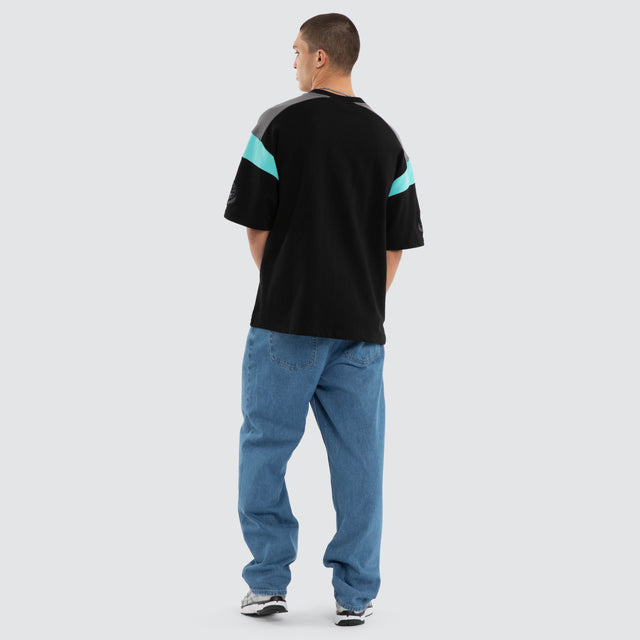 Model wears Conquer Loopback Raptor Tee Black/Turquoise T-Shirts Black – image 2