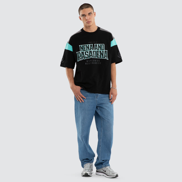 Model wears Conquer Loopback Raptor Tee Black/Turquoise T-Shirts Black – image 5