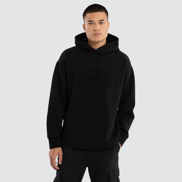 Model wears Supreme Relaxed Curved Hoodie Jet Black Hoodies Black – image 1