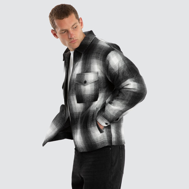Model wears Rise Relaxed Jacket Black/White Check Jackets Black – image 3