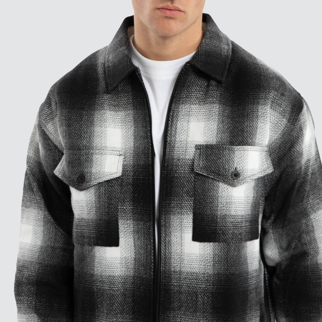 Model wears Rise Relaxed Jacket Black/White Check Jackets Black – image 4