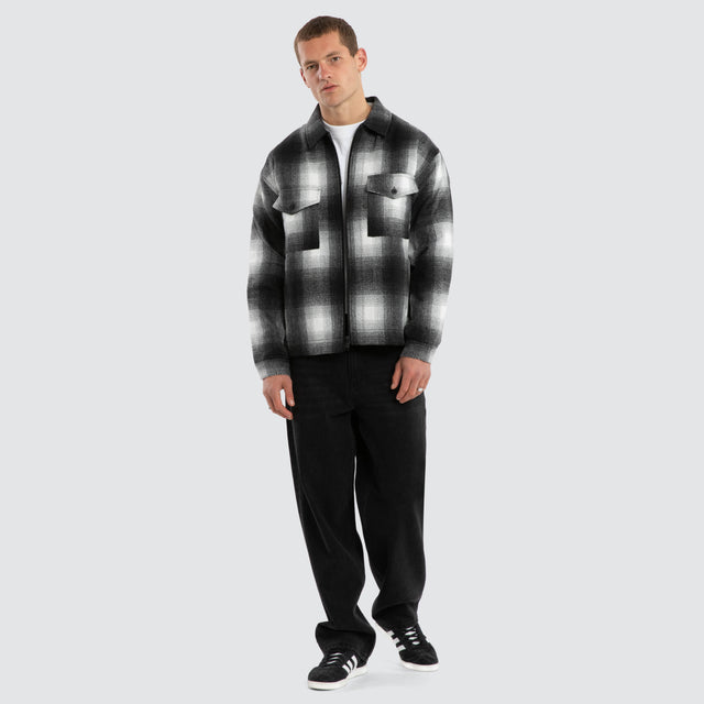 Model wears Rise Relaxed Jacket Black/White Check Jackets Black – image 5