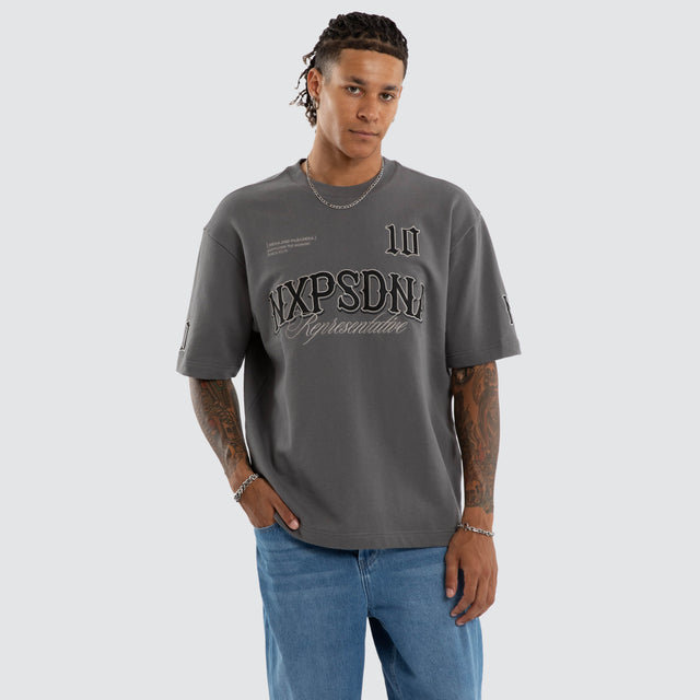 Model wears Warrior Loopback Oversized Tee Charcoal T-Shirts Grey – image 1