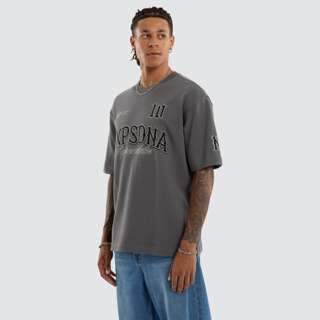 Model wears Warrior Loopback Oversized Tee Charcoal T-Shirts Grey – image 3