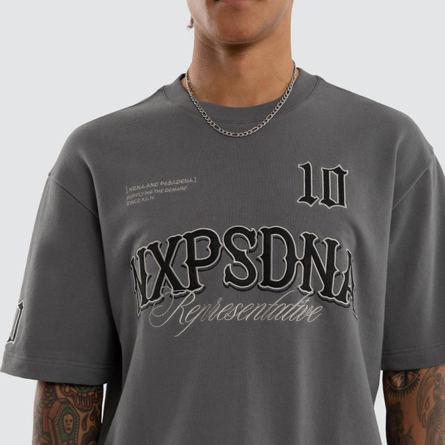 Model wears Warrior Loopback Oversized Tee Charcoal T-Shirts Grey – image 4