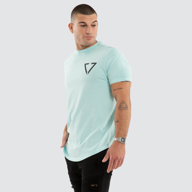 Model wears NXP Eidolon Curved Hem Tee Pigment Blue T-Shirts in Blue - Image 3