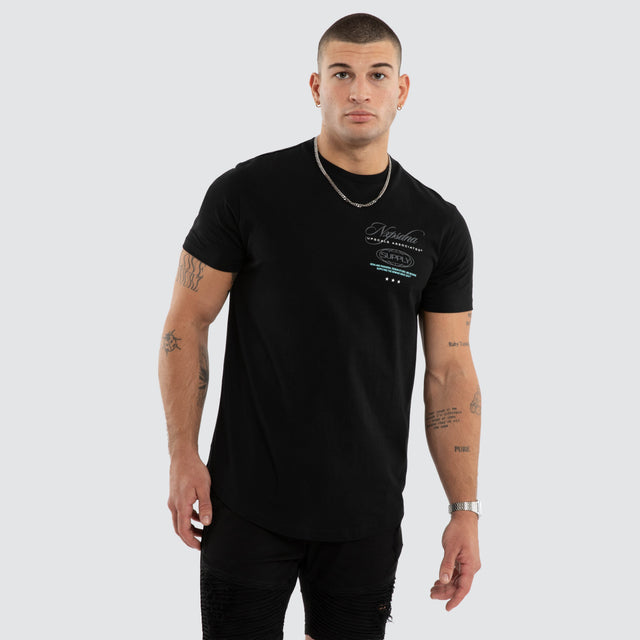 Model wears NXP Blackreach Curved Hem Tee Black T-Shirts in Black - Image 2