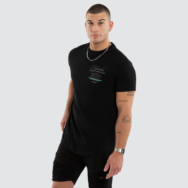 Model wears NXP Blackreach Curved Hem Tee Black T-Shirts in Black - Image 4