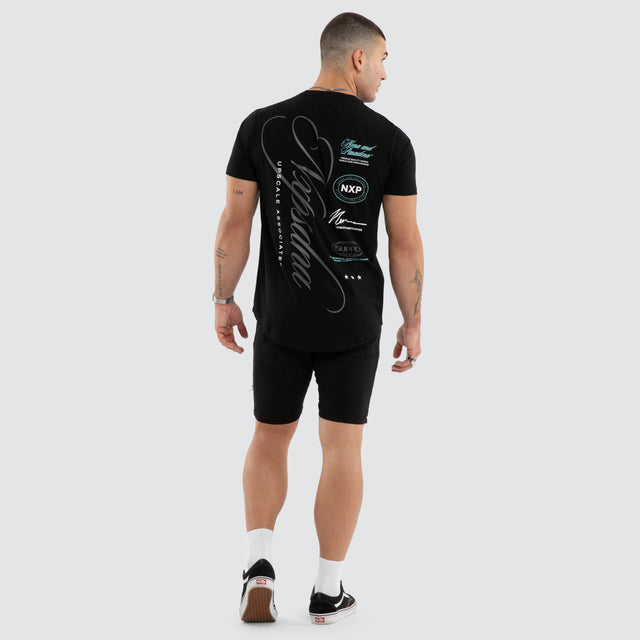 Model wears NXP Blackreach Curved Hem Tee Black T-Shirts in Black - Image 6