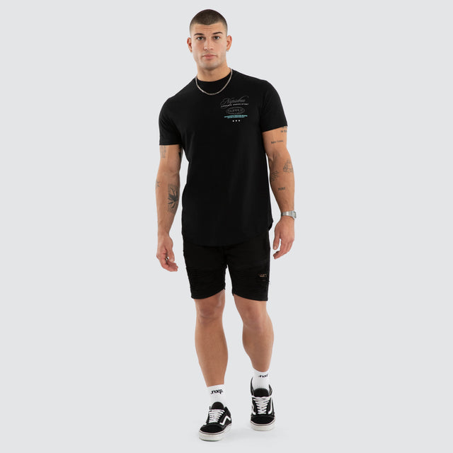 Model wears NXP Blackreach Curved Hem Tee Black T-Shirts in Black - Image 5
