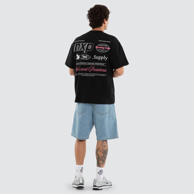 Model wears NXP Nightworks Raptor Tee Black T-Shirts in Black - Image 6