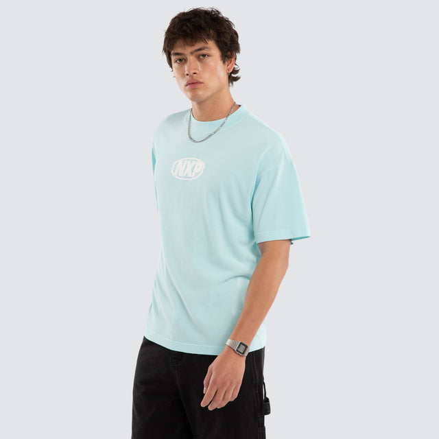 Model wears NXP Palladium Raptor Tee Blue T-Shirts in Blue - Image 3