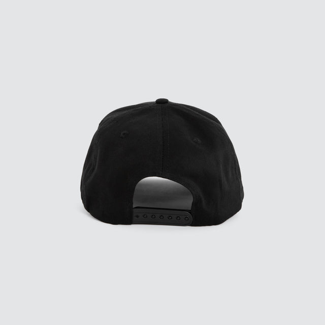 Model wears Axis Cap Jet Black Caps Black – image 3