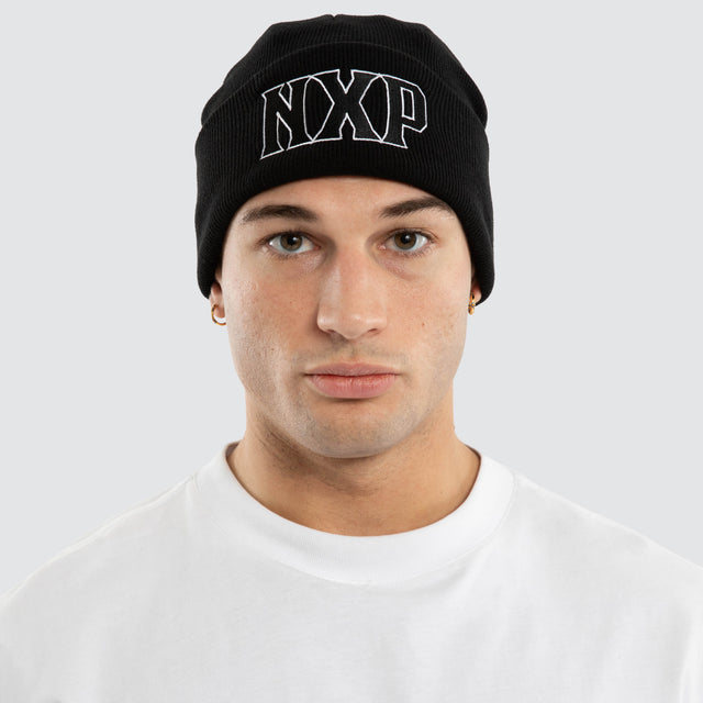 Model wears Pillar Beanie Jet Black Headwear Black – image 2