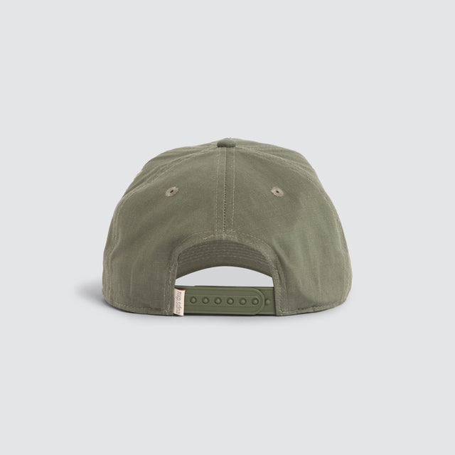 Model wears Legacy Cap Khaki Headwear Green – image 5