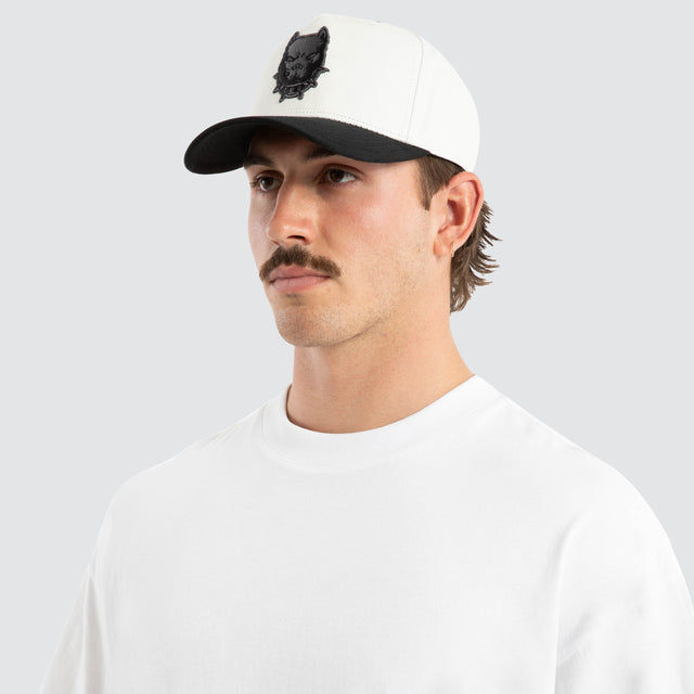 Model wears Conrad Cap Natural White Headwear White – image 2