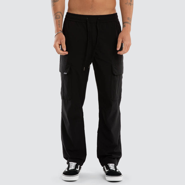 Model wears Delta Elastic Waist Nylon Cargo Pant Black Pants Black – image 3
