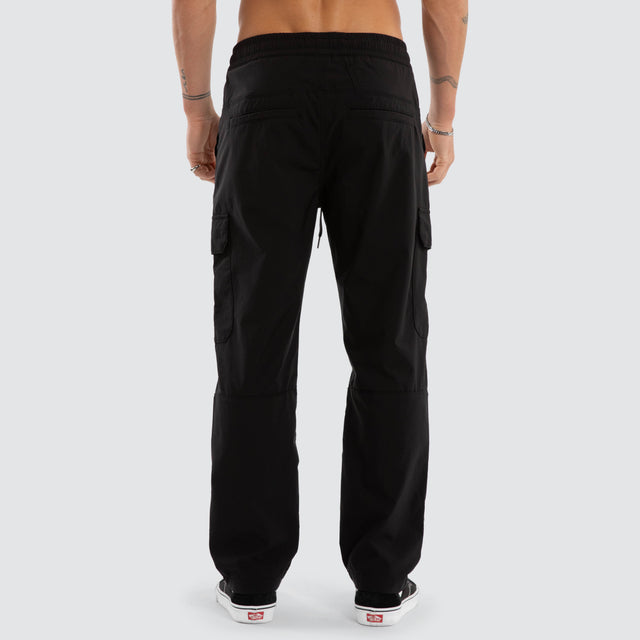 Model wears Delta Elastic Waist Nylon Cargo Pant Black Pants Black – image 4