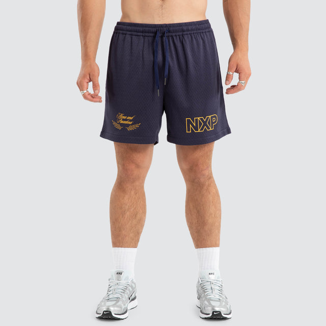 Model wears Essence Trigger Mesh Short Navy Shorts Blue – image 4