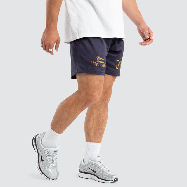 Model wears Essence Trigger Mesh Short Navy Shorts Blue – image 1