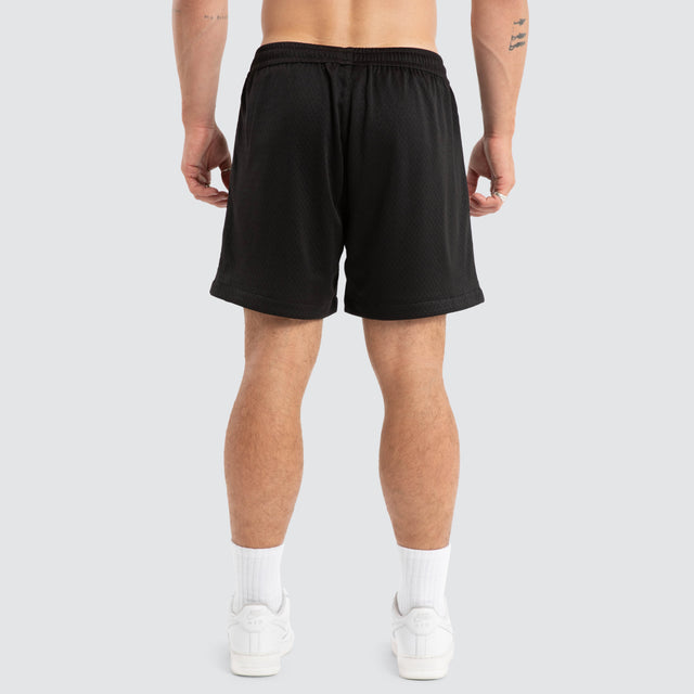 Model wears Mercy Trigger Mesh Short Jet Black Shorts Black – image 4