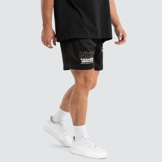 Model wears Mercy Trigger Mesh Short Jet Black Shorts Black – image 1