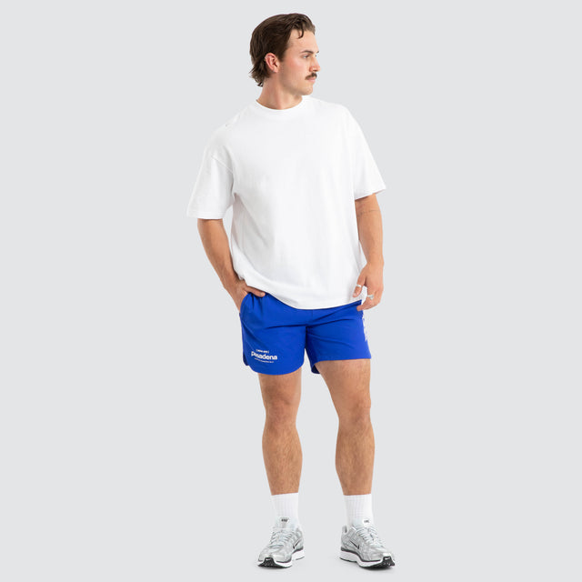 Model wears Demand Trigger Short Dazzling Blue Shorts Blue – image 2