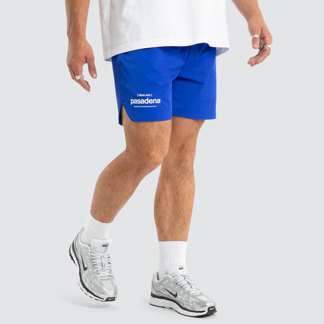 Model wears Demand Trigger Short Dazzling Blue Shorts Blue – image 1