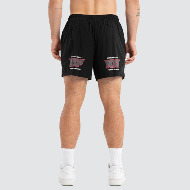 Model wears Sevens Rugby Short Black Shorts Black – image 4