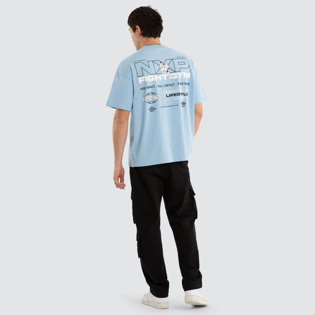 Model wears Script Raptor Tee Blue Bell T-Shirts Blue – image 4