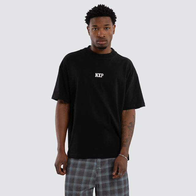 Model wears Foundation Raptor Tee Anthracite Black T-Shirts Black – image 1