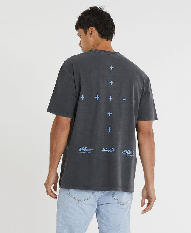 Back view of a man wearing a Kiss Chacey box fit t-shirt in grey with ribbed collar neckline, designed with light blue small cross prints and the brand's logo.