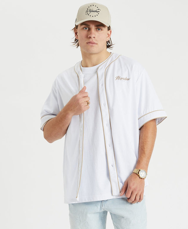 Man showcasing NXP's Allegiance Baseball shirt in white with gold stitching