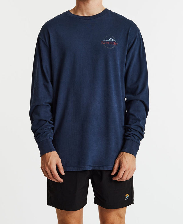 Physical long sleeve tshirt in pigmented indigo colour with small nomadic print on the right chest side