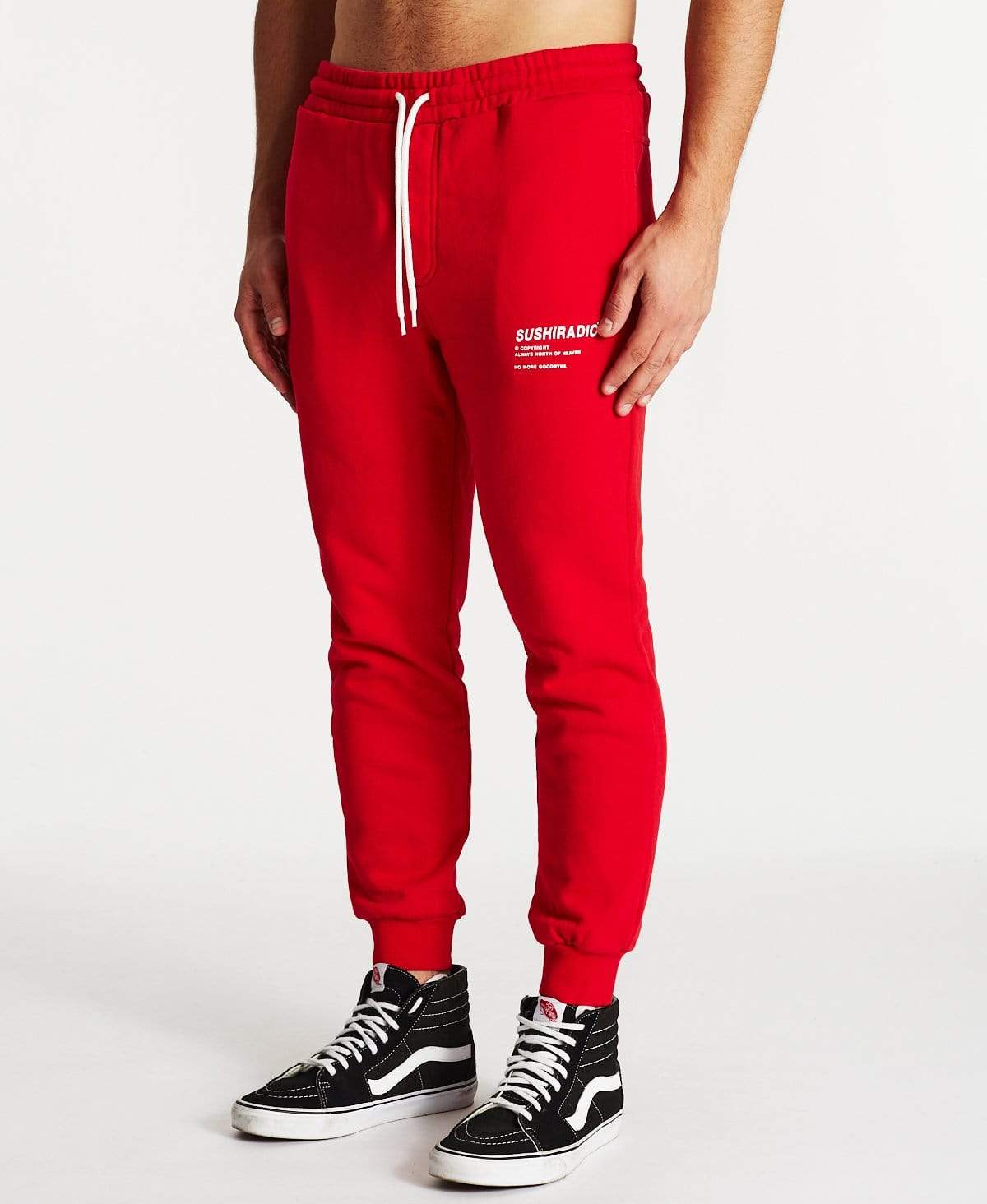 Fear of god on sale track pants red